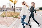 Twin sisters, outdoors, running