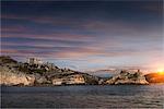 View of Church of St Peter on headland at sunset, Porto Venere, Liguria, Italy