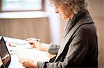 Woman working at desk in office