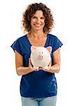 Portrait of a happy middle aged woman holding a Piggybank