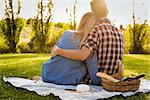 Shot of a happy couple enjoying a day in the park together