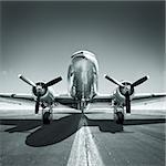 old aircraft on a runway is waiting for take off