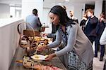 Delegates At Lunch Buffet During Conference Break