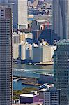 A sightseeing boat cruises up the Sumida River in Tokyo, Japan.
