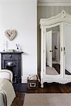 Interior view of a residential building decorated in Edwardian Style, in Newcastle-upon-Tyne, UK. Wardrobe in the bedroom.