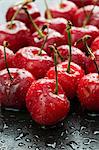 Fresh cherries with drops of water (close-up)