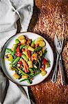 Fried vegetables with baby corn cobs (seen from above)