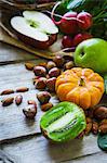 An arrangement of fruit, vegetables and nuts