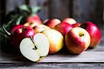 Apples on rustic wooden surface