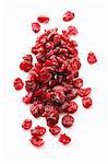 Dried cranberries on a white surface