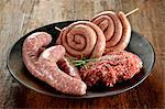 Raw minced beef and sausages