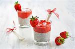 Dessert made from strawberry mousse with chia seeds in glasses garnished with fresh fruit