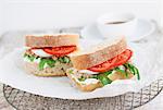 Ciabatta sandwiches with tuna fish, quark, rocket, tomatoes and egg