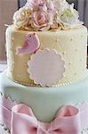 A festively decorated cake in delicate pastel tones