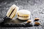 Almond macaroons on a black stone