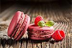 Raspberry macaroons on a wooden table