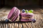 Blueberry macaroons on a wooden table