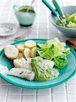 Grilled cod with a cress sauce and potatoes