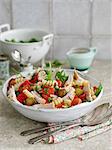 Quick pasta salad with chicken, tomatoes and gherkins