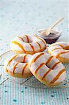 Doughnuts with icing and caramel stripes
