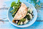 Tortilla with cauliflower, fava beans and avocado