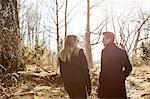 Couple walking in forest