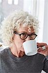 Portrait of senior woman drinking from cup