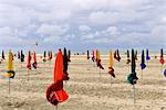 France, Northern France, Lower Normandy, Deauville, seafront, beach before the storm, umbrellas