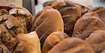 Einkorn bread and sourdough bread kept together at the bakery counter in the supermarket