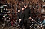 Couple in bicycle shop