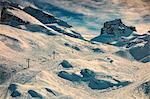 Ski lift on snow covered mountain, Engelberg Titlis, Swiss Alps, Switzerland