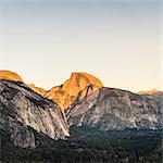 Elevated view of valley forest and mountains at sunset, Yosemite National Park, California, USA