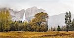 Landscape with distant misty waterfall, Yosemite National Park, California, USA