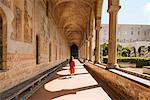 Woman in corridors, Santa Chiara Monastery, Campania, Italy