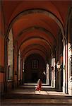Woman in corridors, Royal Palace of Naples, Italy