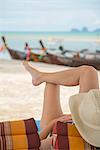 Woman relaxing on tropical beach