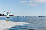 Woman standing on ice floe