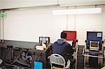 Mechanic using laptop