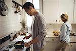 Couple preparing food in the kitchen