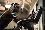 Fit woman exercising on a treadmill in the gym