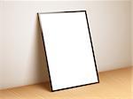 Blank white paper poster standing on wooden floor. Poster mock-up template