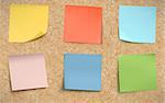 Vector illustration of multicolor post it notes on detailed cork bulletin board.