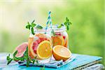 Water detox with Grapefruit and Orange. Concept for healthy eating and nutrition. Selective focus.