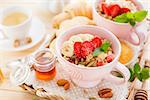 Porridge with banana and fresh berries. Healthy Breakfast