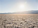 Flat dry mud landscape at Badwater Basin in Death Valley National Park, California, USA