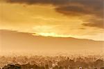 Misty cityscape at sunrise, Moshi, Kilimanjaro, Tanzania, Africa