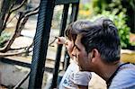 Father and little girl in city farm