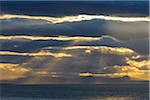 Firth of Forth with clouds and sunbeams at sunset at North Berwick in Scotland, United Kingdom