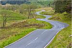 Winding country road at Glen Nevis near Fort William in Scotland, United Kingdom