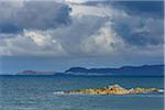 Scottish coast with ocean and cloudy sky at Mallaig in Scotland, United Kingdom